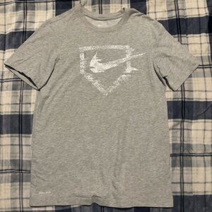 The Nike Tee Baseball Home Plate Swoosh Graphic